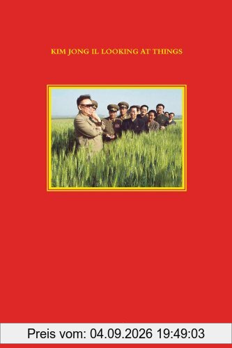 Kim Jong Il looking at things